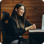 An insurance agent speaks with a client in a virtual meeting.